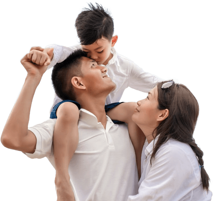 Parents affectionately holding small child on shoulders
